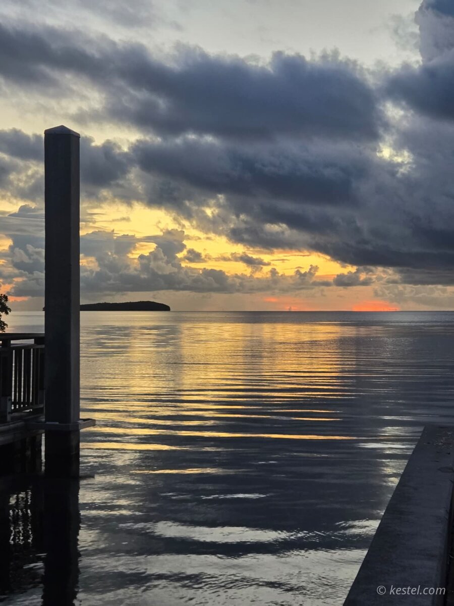 Dramatic stormy sunset viewed from a dock
