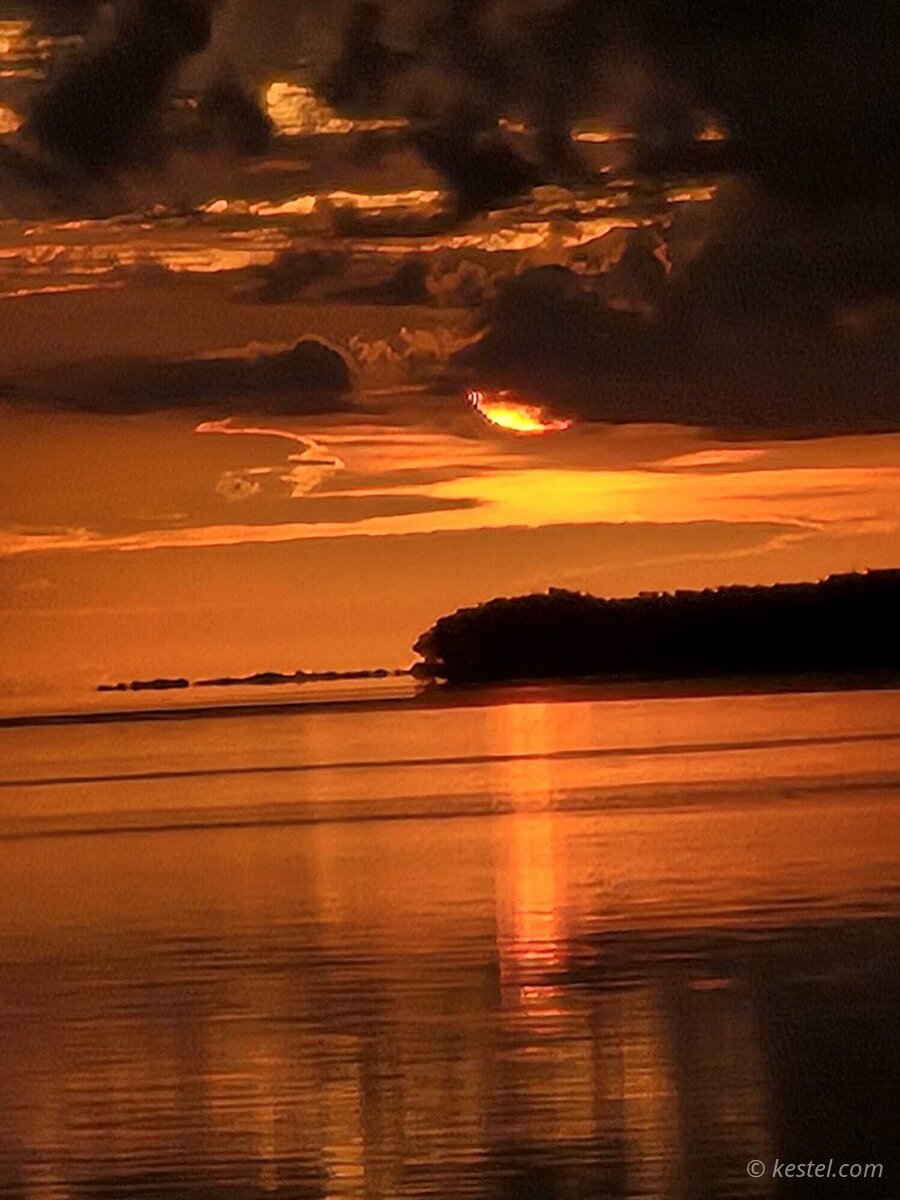 Virginia Key sunrise over the bay with dramatic clouds